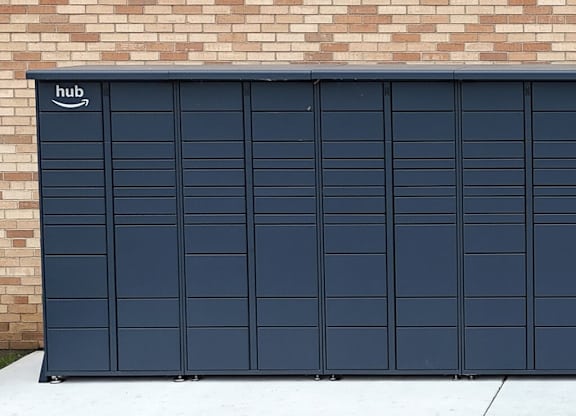 A dark blue Amazon hub garage door.
