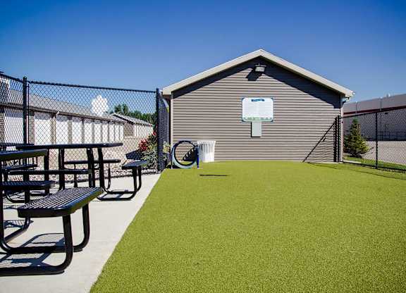 our apartments showcase a dog park with a playground