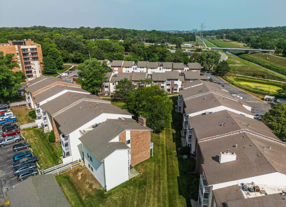arial view of a housing complex with trees with Controlled Access