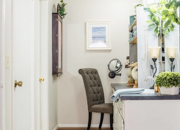 primary bedroom with a desk and chair