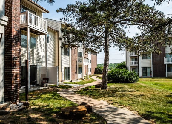 our apartments offer a tree shaded walkway