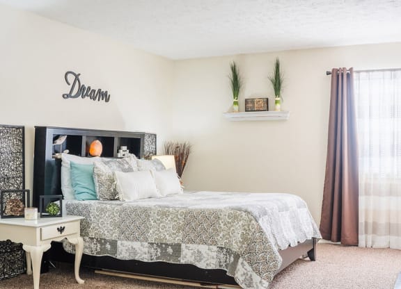 bedroom with a bed and window