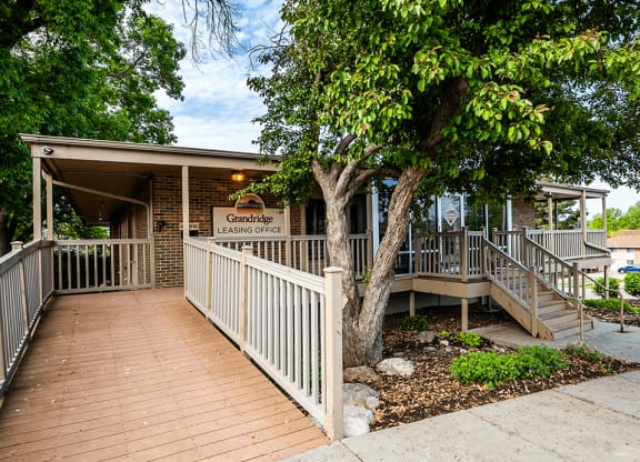 leasing building with a wooden ramp