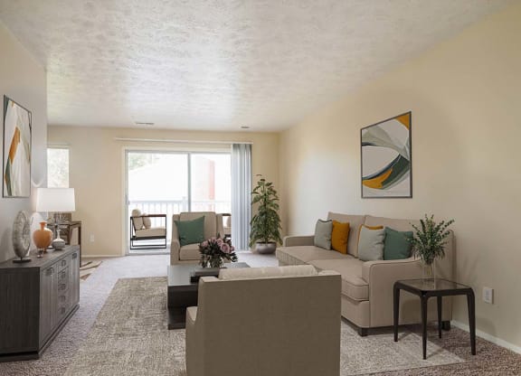 living room with attached balcony area