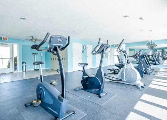 fitness center at apartment community