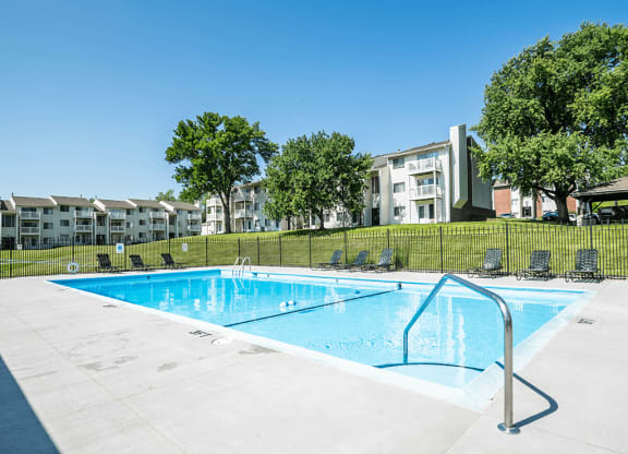 a swimming pool at apartment building