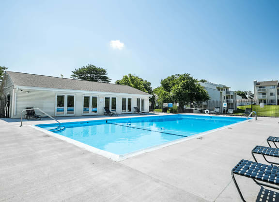 apartment complex with outdoor swimming pool