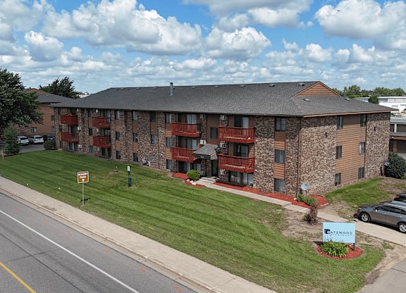 Apartment building with a sign that says