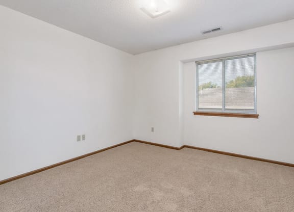 bedroom with white walls