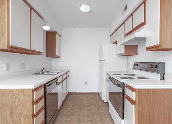Kitchen with white cabinets and a dishwasher