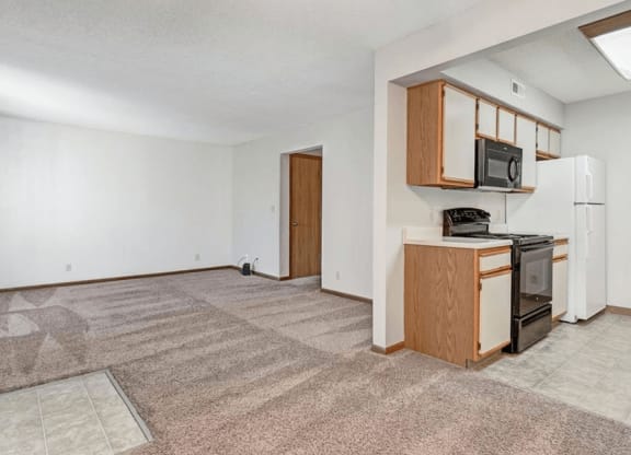 living room and kitchen at apartment complex