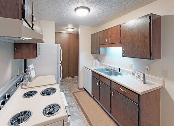kitchen with dishwasher at pointe west apartments