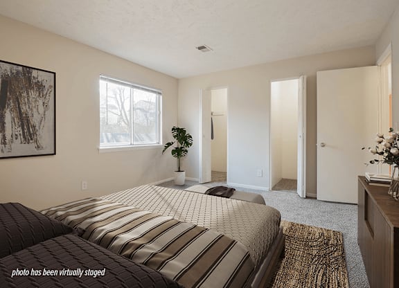 Apartment bedroom with walk in closet