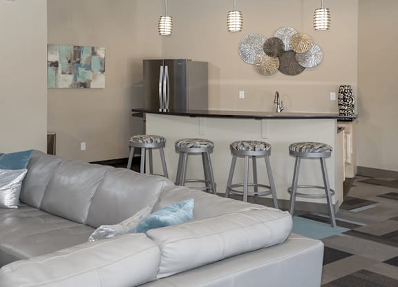 Kitchen area with barstools at windsor gates apartments