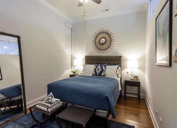 Bedroom with cozy bed at Wells Place Apartments, Illinois, 60607