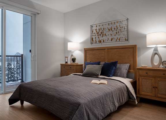 a bedroom with a bed and a window at 2929 on Mayfair, Wisconsin
