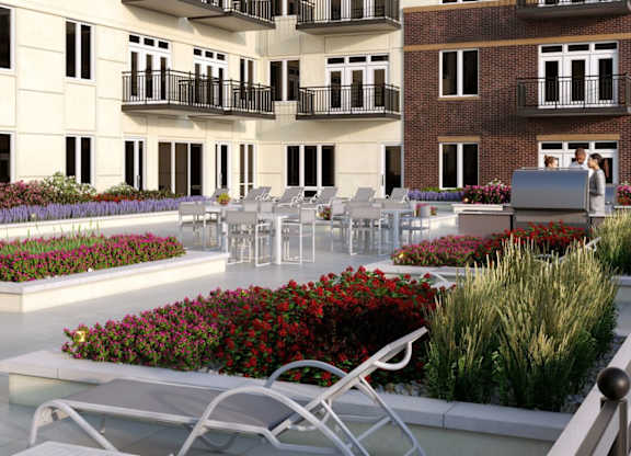 Lake Shore Relax Outside on the Large Deck at The Residences of Wilmette, Wilmette, IL