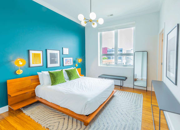Cozy bed and lights at Wells Place Apartments, Illinois, 60607