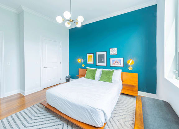 Cozy bed at Wells Place Apartments, Illinois