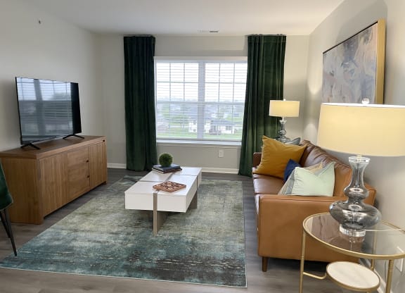 a living room with a couch and a coffee table