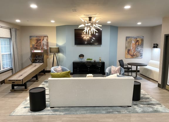 a living room with a couch and a table