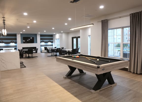 pool table in clubhouse at the flats at 2600 apartments