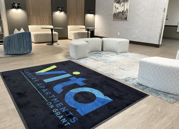 a rug that has the word info on it in a lobby