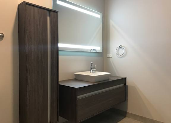 Sleek floating vanities at The Residences of Wilmette, Wilmette, Illinois