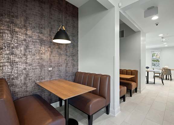 Banquette seating in the free coffee bar