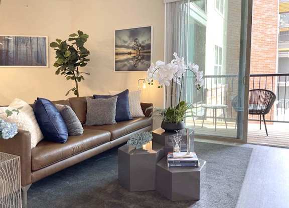 Living Room With Balcony at Elevate Apartments, Madison, Wisconsin
