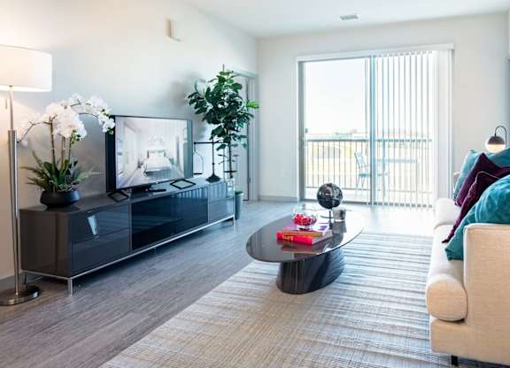 A modern living room  at Elevate Apartments, Madison, WI