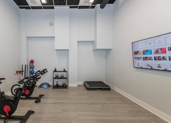 Work out room free weights at The Residences of Wilmette, Illinois