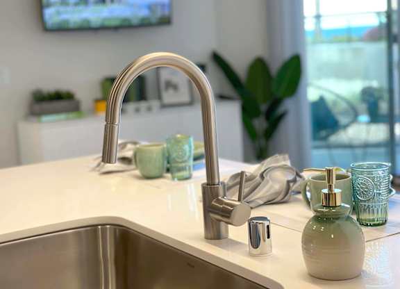 a kitchen with a sink and a faucet at 42 Hundred On The Lake, St Francis, WI, 53235