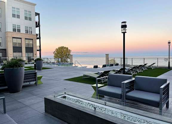 patio view overlooking Lake Michigan at sunset at 42 Hundred On The Lake, Wisconsin, 53235
