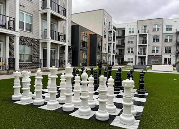 a giant chess board in front of an apartment complex at 42 Hundred On The Lake, St Francis, WI, 53235