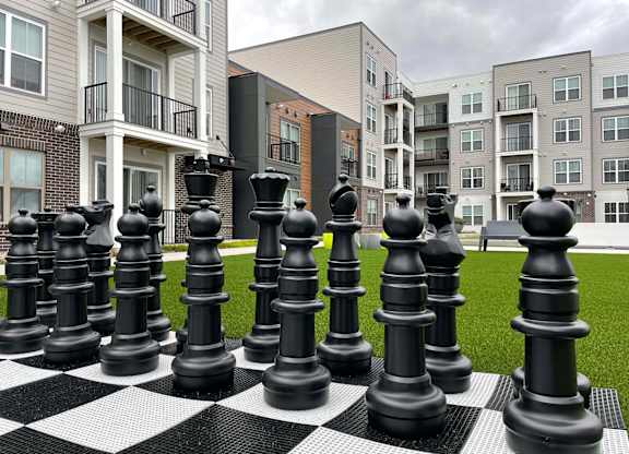 Enjoy the outdoor space with outdoor chess board at 42 Hundred On The Lake Apartments, St Francis, WI