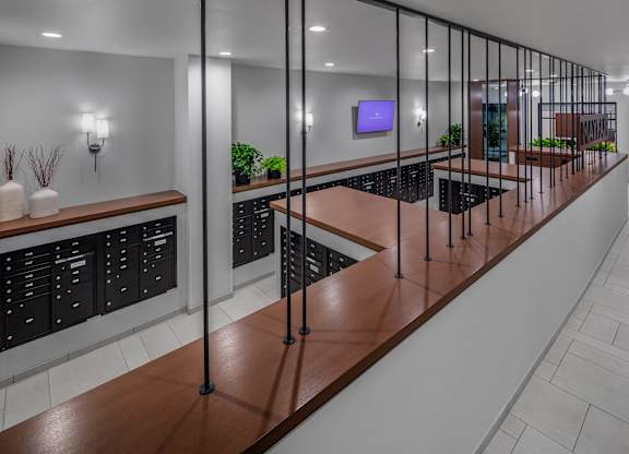 a long bar with a wooden counter top and a row of wine racks at 2929 on Mayfair, Wisconsin, 53222