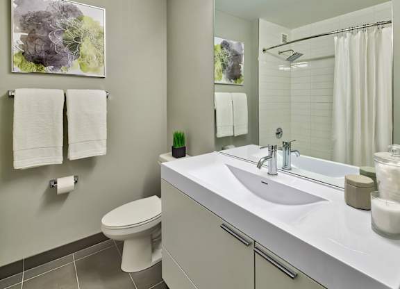 a bathroom with a sink and a toilet  at The Kent, Illinois