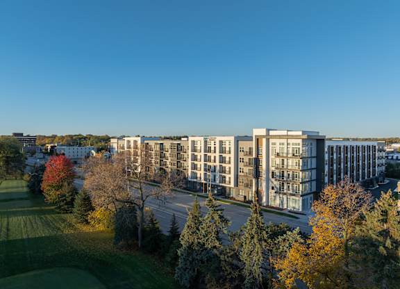 an aerial view of a large apartment building on a city street at 2929 on Mayfair, Wauwatosa, Wisconsin