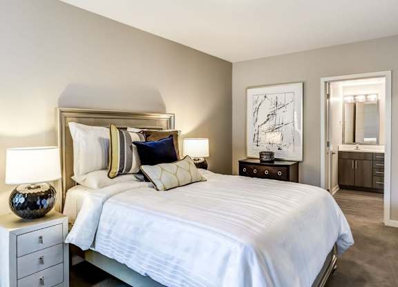 Bedroom with cozy bed and lamp at Apex 41, Lombard, IL, 60148
