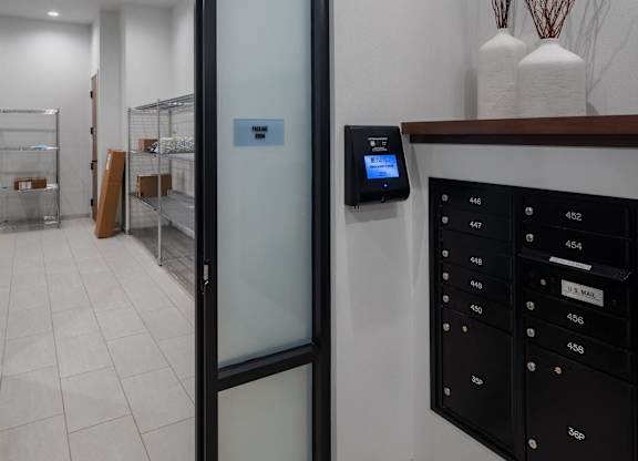 a glass door leading into a room with a mail room and a counter with mail at 2929 on Mayfair, Wauwatosa, WI