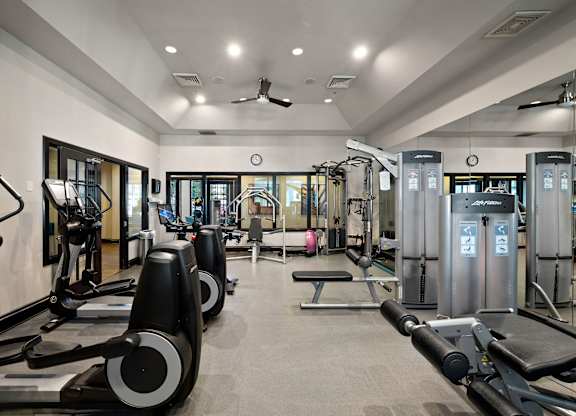 Fitness Center w
ith treadmills, weights, and exercise equipment.