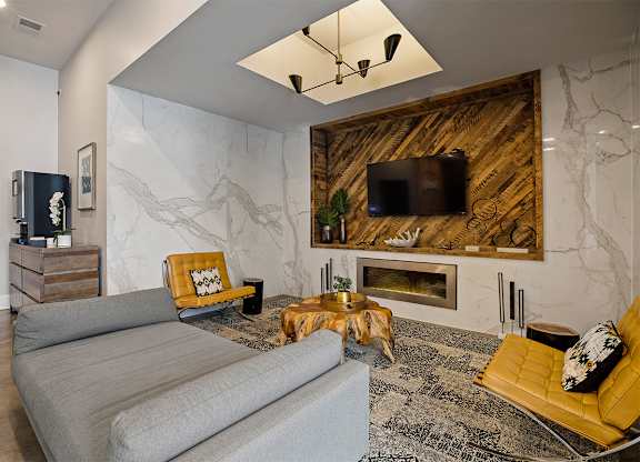 Living room with couch and tvat The Shelby, Chicago