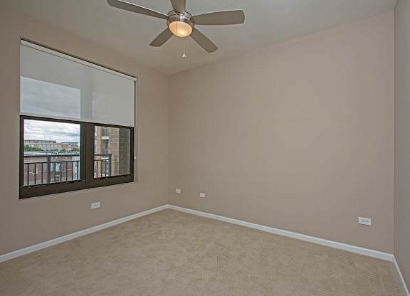 Room with ceiling fan and light at The Shelby, Illinois