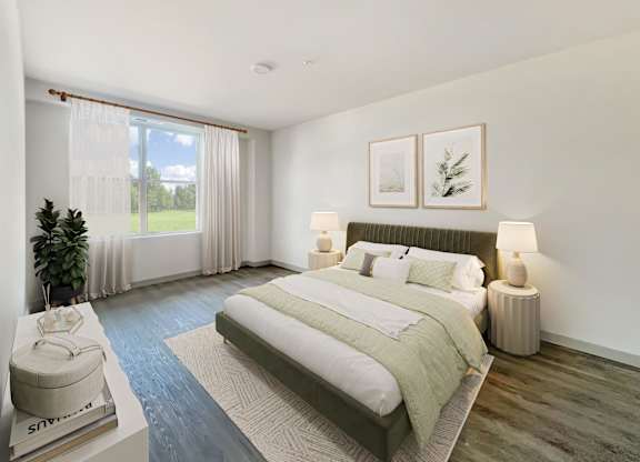 Altura Apartments large bedrooms featuring spacious closets, woodgrain flooring, and ample natural light from windows.
