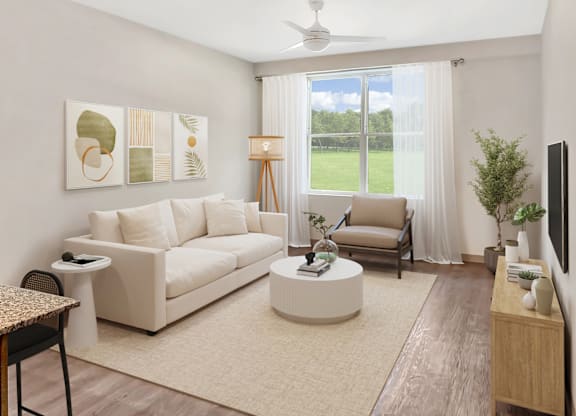 Altura Apartments living room featuring a ceiling fan for air circulation.