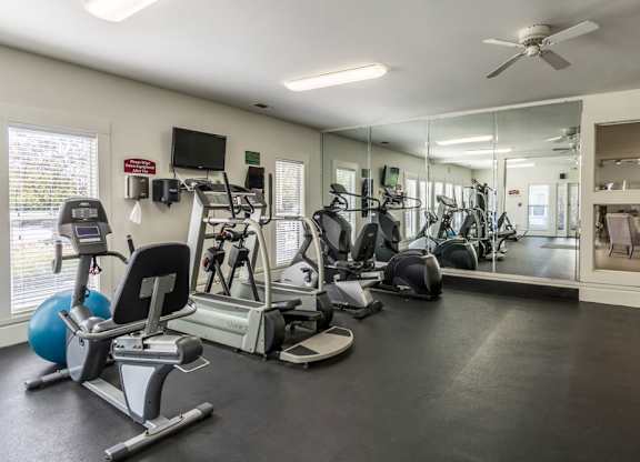 24-hour fitness center at Britton Woods Apartments in Dublin, Ohio, featuring free weights and cardio machines