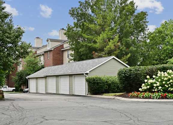 Patchen Oaks Apartments - Exterior Green Spaces & Garages