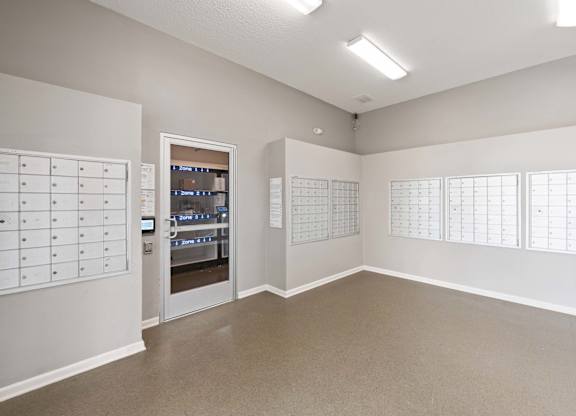A mail room at Reserve at Hamburg with a selection of lockers in Hamburg, KY.