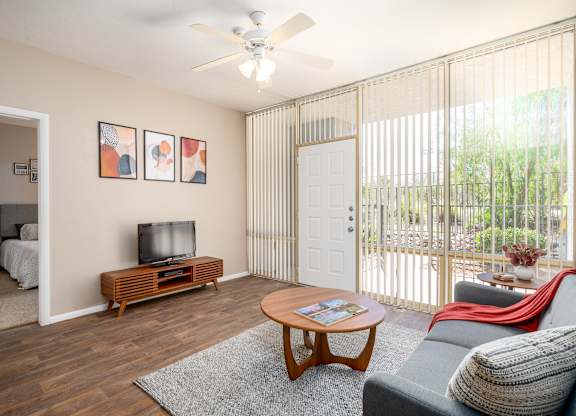 a living room with a couch and a tv